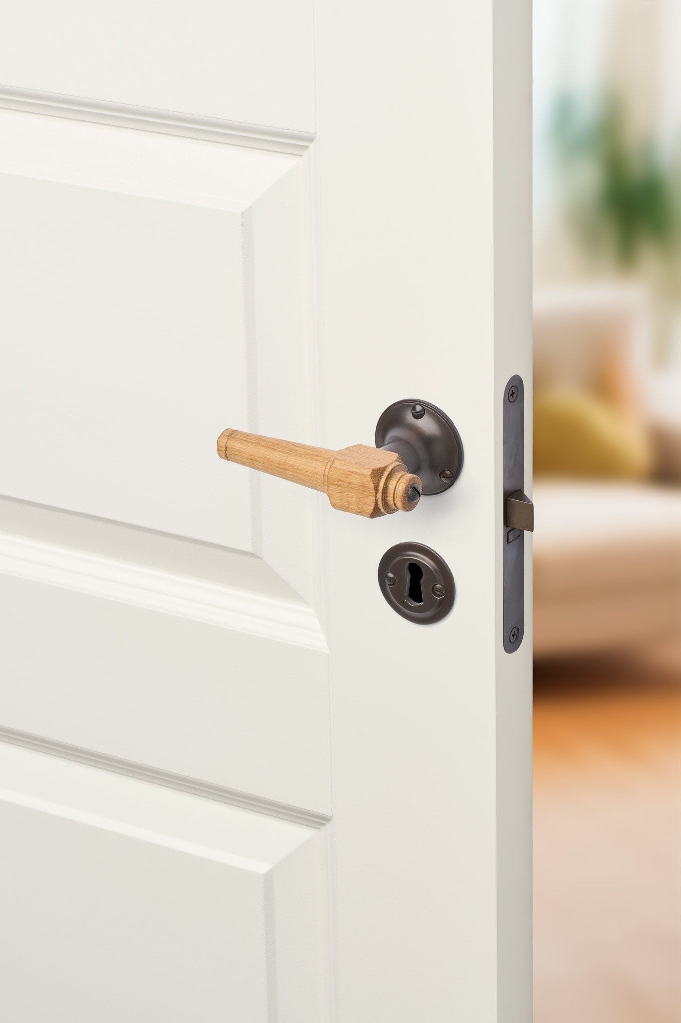 Svanemølle | Dørhåndtag i Egetræ med klassiske rosetter og nøgleskilte i Bruneret Messing L 111 mm (C/C 30 mm) Sibes SM-EN-1770-BB FINICC